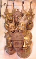 Tribal Art. Various Benin type brass grotesque masks etc.