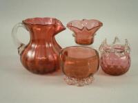 Three items of Victorian cranberry glass