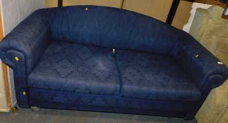 A two-seater sofa, finished in a blue geometric fabric, roll on detail, overall size 170cm wide x 65cm high x 78cm deep.