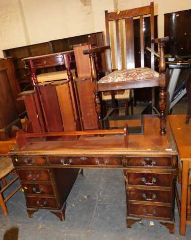 An early 20thC oak pedestal desk, with leather top, and frieze drawers, 140cm wide x 75cm high x 75cm deep, together with a group of book stands, a mahogany demi lune table with tooled leather inset, and a carver chair upholstered in a floral fabric.