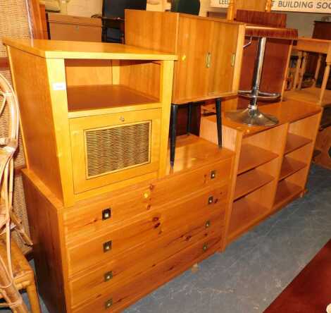 An oak bookcase, pine dresser, beech bedside unit, and mid century sliding two door, splay legged cabinet, etc. (a quantity)