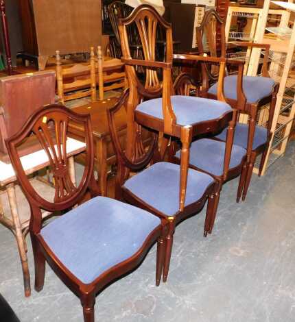 A set of six dining room chairs, including two carvers, four seats upholstered in a blue velour fabric.