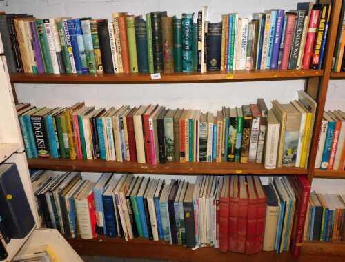 Various books, relating to antiques, John Le Carre, bound Discovering Antiques magazines, etc. (3 shelves)