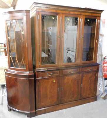 A mahogany and inlaid display cabinet, together with a matching corner cabinet.