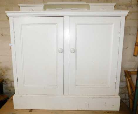 A white melamine cupboard.