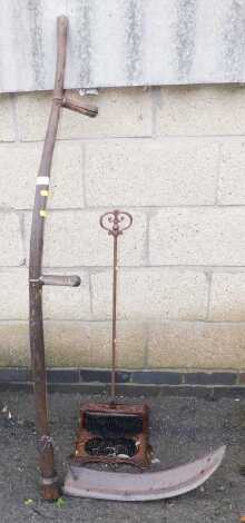 A Scythe, together with a cast iron boot scraper.