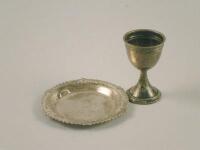 A small silver pin tray and an egg cup