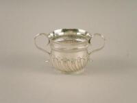 A Victorian silver porringer with part fluted decoration