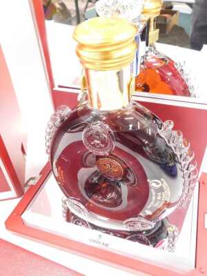 A bottle of Remy Martin Louis XII Cognac, in presentation box, with registration number KA-8163. - 2