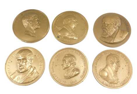 An associated set of six 19thC gilt bronze medallions, each depicting a president of the United States, William H Harrison, Zachary Taylor, Ulysses S Grant, Martin van Buren, and Benjamin Harrison, all early to mid 19thC and with differences to the border