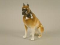 A Royal Dux porcelain figure of a Boxer