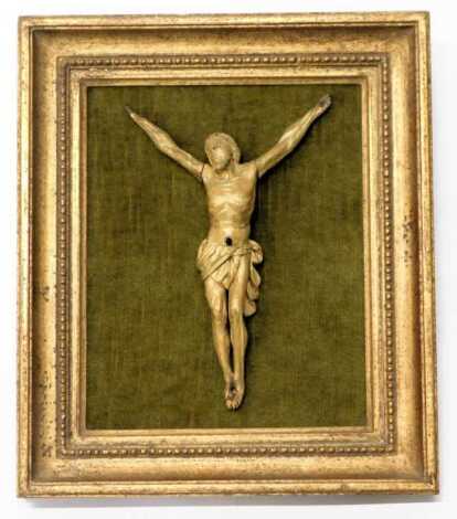 A giltwood carving of Christ's crucifixion, 23.5cm high, framed.