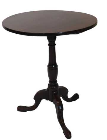 A George III Mahogany occasional table, the circular top on a turned column and shaped tripod legs with pad feet, 50cm diameter.