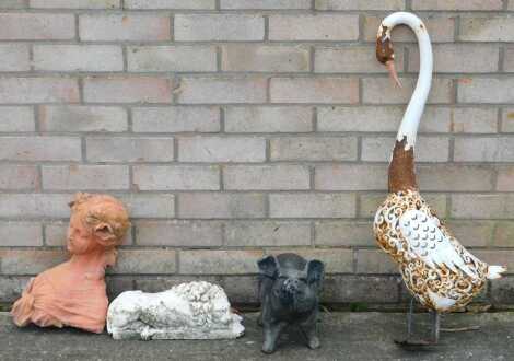 A pig garden ornament, and other ornaments. (4)