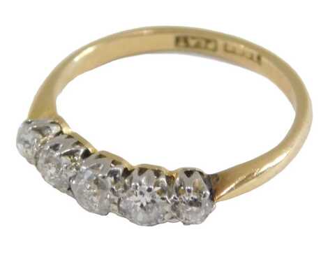 A diamond five stone ring, set with rose cut diamonds, in yellow metal, stamped 18ct and plat, approximately 0.5ct, size N, 2.3g.