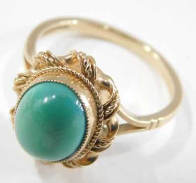 A 9ct gold and turquoise ring, size M½, 9ct gold and coral ring, in a circular design, size N, and a blue hard stone ring, set in yellow metal, unmarked, size H½, 8.2g all in. - 3