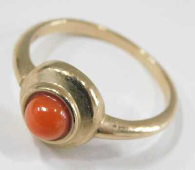 A 9ct gold and turquoise ring, size M½, 9ct gold and coral ring, in a circular design, size N, and a blue hard stone ring, set in yellow metal, unmarked, size H½, 8.2g all in. - 4
