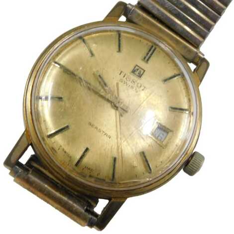 A Tissot Seastar gentlemans gold plated wristwatch, with circular gilt dial, centre seconds, date aperture, on elasticated strap.