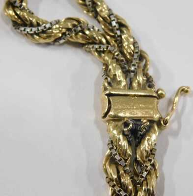 A bicolour two strand box and rope twist bracelet, on a snap clasp, stamped 750, 24.4g. - 3