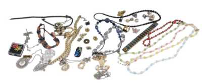 A group of costume jewellery, including necklaces, beads, tartan bracelet, clip earrings, brooches, and pewter pendants on chains.