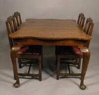 An oak extending dining table