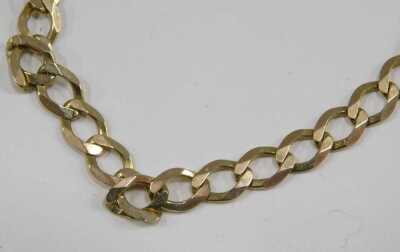 A 9ct gold curb link neck chain, on a lobster claw clasp, 11.8g. 23cm long. - 2