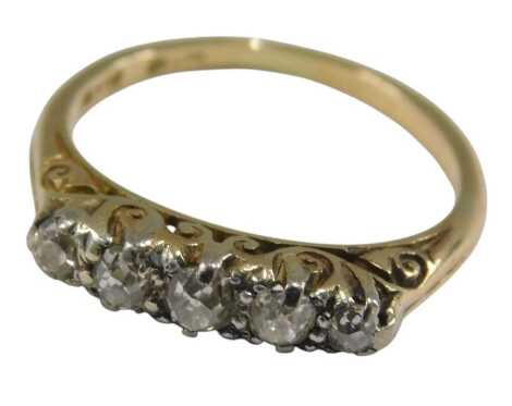 A Victorian diamond five stone ring, set with five graduated rose cut diamonds, approximately 0.25ct, size P, 4.0g.