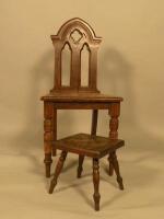 A Victorian gothic oak hall chair