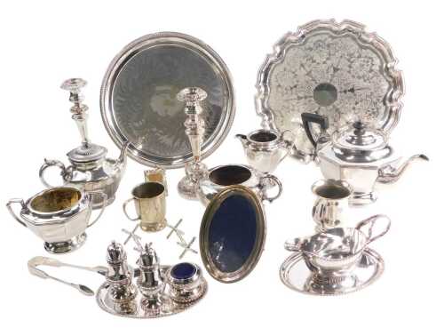 A quantity of silver plate, to include a pair of candlesticks, a salver, teapot, etc.