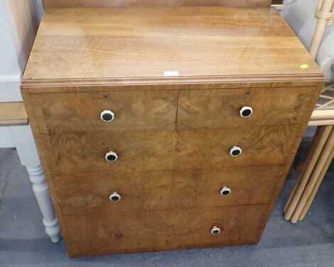 A 20thC walnut chest, of two short and three long drawers, one handle missing, 96cm high, 83cm wide, 45cm deep.