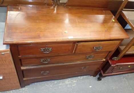 An early 20thC mahogany chest of two short and two long drawers, formerly a dressing table, 82cm high, 105cm wide, 48cm deep.