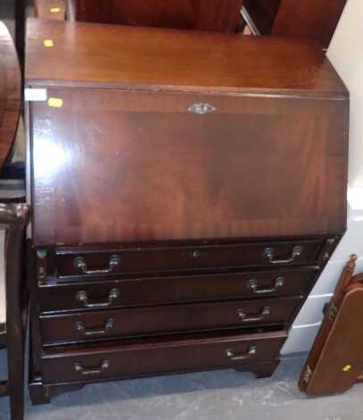 A group of furniture, to include a Georgian style bow fronted sideboard with frieze drawer, flanked by two cupboards, on square tapering legs, with splayed feet, 84cm high, a mahogany bureau, etc. (a quantity)