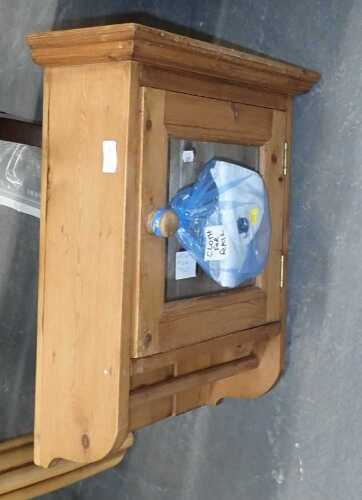 A pine hanging cabinet, with glazed door, 53cm high.