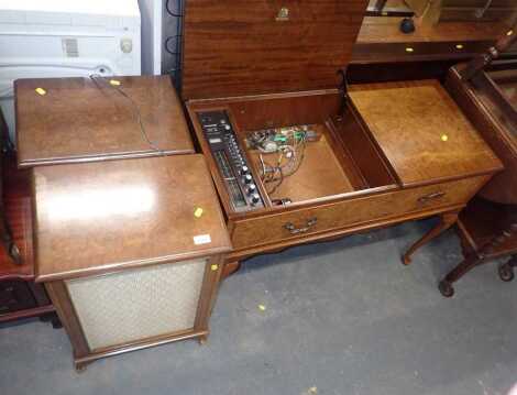 A walnut cased Dynatron radiogram, lacking record player, together with two speakers.