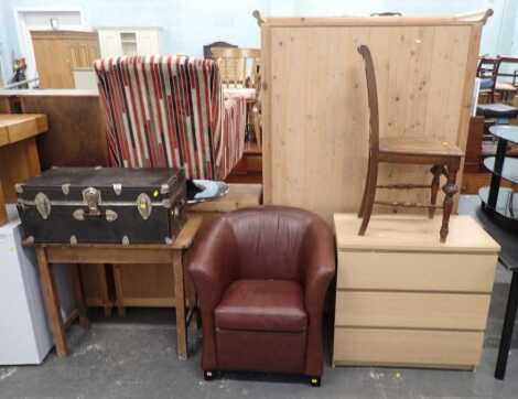 A group of furniture, to include a pine side table, travelling trunk, faux leather tub chair, three drawer chest, and a cane seated chair. The upholstery in this lot does not comply with the 1988 (Fire & Fire Furnishing) Regulations, unless sold to a know