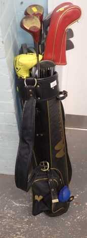 A Malibu golf bag, containing various golf clubs, to include an Aldridge HBNS number 3 putter, etc.