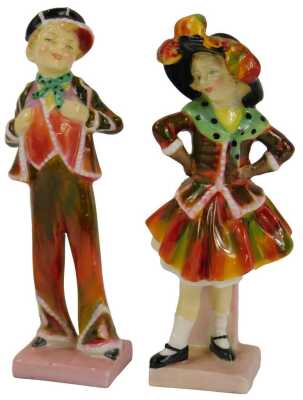 Two Royal Doulton porcelain figures, modelled as Pearly Boy, HN2035, and Pearly Girl, HN2036.