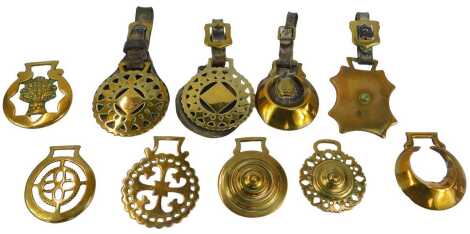 A group of horse brasses and martingales, some leather backed. (1 tray)