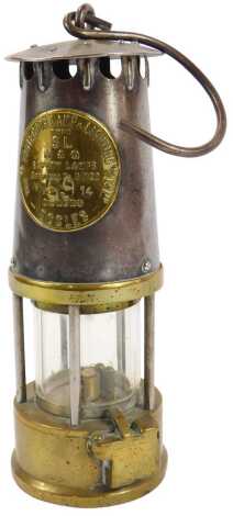 A Protector Lamp and Lighting Company Ltd Eccles type SL miner's lamp, number NN5914, with handle, 23cm high.