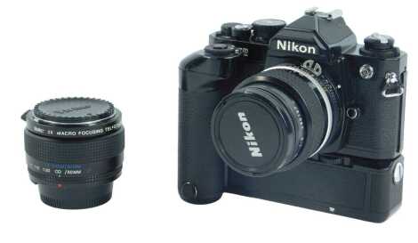 A Nikon FM2 camera, serial number N7541813, together with a Nikon 24mm lens, and Vivitar 2x macro lens.