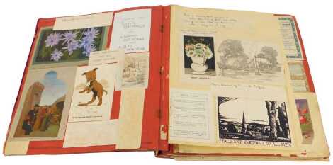 A 20thC scrap album, containing greetings cards, postcards to include Canterbury Cathedral, Christmas cards, etc.