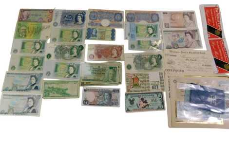 Various banknotes, GB and world, to include Central Bank of the Bahamas one dollar, a Union Bank of London cheque dated 1894, Bank of England one pound note, five pound notes, a Wimborne, Poole and Blandford Bank one pound note, etc.