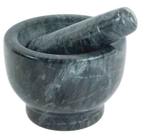 A black marble pestle and mortar.