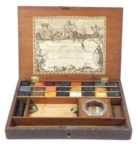 A 19thC artist's paint box, by W J Reeves & Woodyear, Number 80 Holborn-Bridge, London, containing 24 Armorial stamped paint tablets and mixing bowl, in a fitted interior, bears paper label, 28.5cm wide.