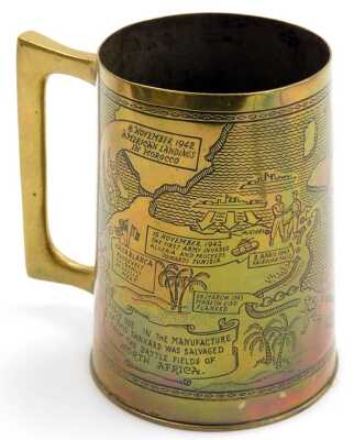 A WWII brass tankard, from salvage metal from the battlefields of North Africa, engraved with a map of Africa showing the landings in 1942 in Morocco, through to the end of the African campaign on the 13th May 1943, 12cm high. - 2