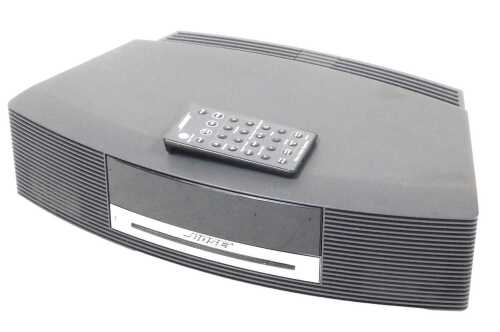 A Bose Wave music system, model AWRCC5, with remote.