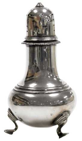 An Elizabeth II silver sugar sifter, of pear form, raised on three hoofed feet, London 1965, 5.93oz.