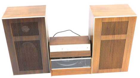 A Ferguson Pollard turntable, stereophonic amplifier, model 201SA, and a pair of teak speaker cabinets, one with internal speaker. (4)