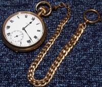 A S.Harnett gold plated open face pocket watch