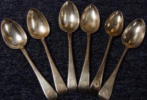 A harlequin set of six Georgian silver dessert spoons